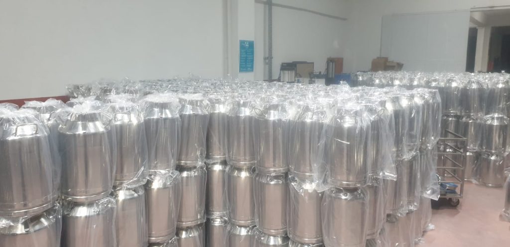 packaging the finished milk cans.